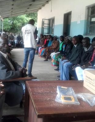 Traditional Birth Attendants gathered at Kahere Clinic waiting to receive Solar lights