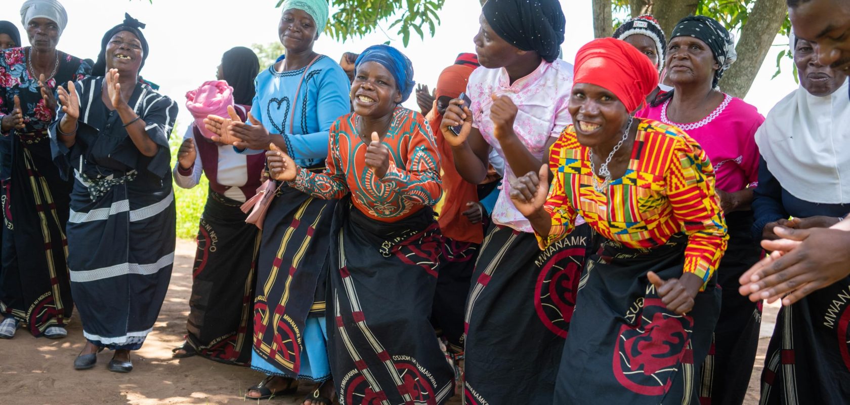 A Mayi Walas group celebrates and dances together