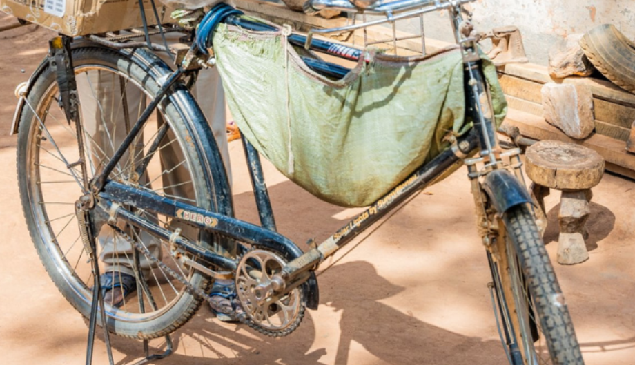 A bike helping a solar agent reach customers in far remote places
